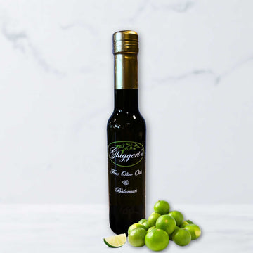 Persian Lime Olive Oil with citrus zest and bright green limes
