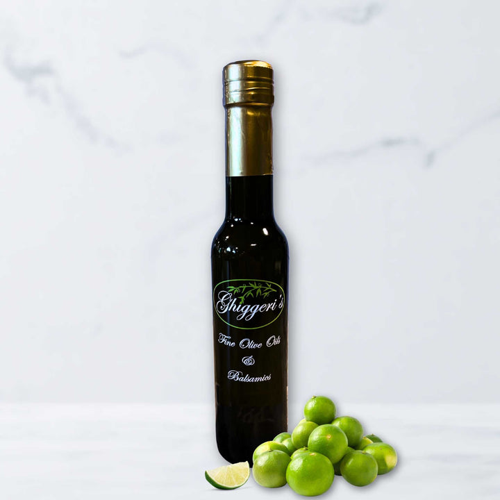 Persian Lime Olive Oil with citrus zest and bright green limes
