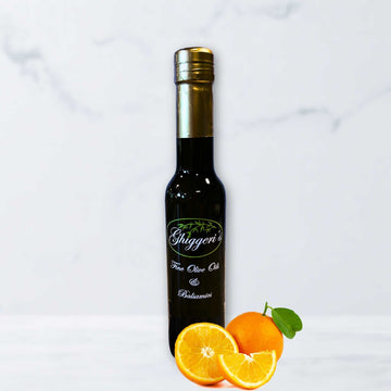 Sweet Valencia Orange Olive Oil with citrus zest and golden hues
