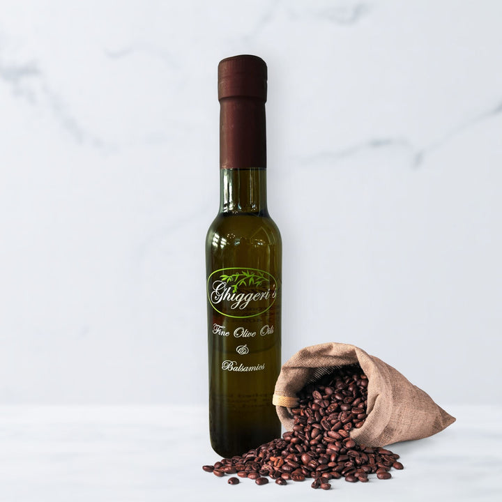 Espresso balsamic vinegar bottle with roasted coffee beans and dark espresso shot