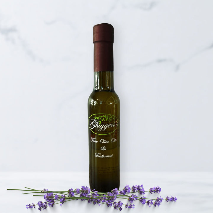 Floral lavender dark balsamic vinegar bottle with dried lavender sprig
